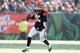 CINCINNATI, OH - DECEMBER 30: Andy Dalton #14 of the Cincinnati Bengals runs with the ball during the NFL game against the Baltimore Ravens at Paul Brown Stadium on December 30, 2012 in Cincinnati, Ohio. (Photo by Andy Lyons/Getty Images)
