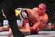 Dec 29, 2012; Las Vegas, NV, USA; Jim Miller (top) and Joe Lauzon (bottom) lock up during UFC 155 at the MGM Grand Garden Arena. Mandatory Credit: Gary A. Vasquez-USA TODAY Sports