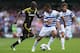 LONDON, ENGLAND - SEPTEMBER 15: Ramires of Chelsea takes on the QPR defence during the Barclays Premier League match between Queens Park Rangers and Chelsea at Loftus Road on September 15, 2012 in London, England. (Photo by Julian Finney/Getty Images)