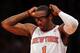 NEW YORK, NY - JANUARY 01: Amar'e Stoudemire #1 of the New York Knicks adjusts his glasses in the first quarter against the Portland Trail Blazers on January 1, 2013 at Madison Square Garden in New York City. NOTE TO USER: User expressly acknowledges and agrees that, by downloading and/or using this photograph, user is consenting to the terms and conditions of the Getty Images License Agreement. (Photo by Elsa/Getty Images)