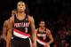 Jan 1, 2013; New York, NY, USA; Portland Trail Blazers point guard Damian Lillard (0) reacts during the fourth quarter against the New York Knicks at Madison Square Garden. Portland won 105-100. Mandatory Credit: Anthony Gruppuso-USA TODAY Sports