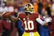 LANDOVER, MD - DECEMBER 30: Robert Griffin III #10 of the Washington Redskins looks ot pass against the Dallas Cowboys in the second quarter at FedExField on December 30, 2012 in Landover, Maryland. (Photo by Rob Carr/Getty Images)