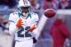FOXBORO, MA - DECEMBER 30: Reggie Bush #22 of the Miami Dolphins catches a pass before a game with the New England Patriots at Gillette Stadium on December 30, 2012 in Foxboro, Massachusetts. (Photo by Jim Rogash/Getty Images)