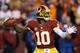 LANDOVER, MD - DECEMBER 30: Robert Griffin III #10 of the Washington Redskins looks ot pass against the Dallas Cowboys in the second quarter at FedExField on December 30, 2012 in Landover, Maryland. (Photo by Rob Carr/Getty Images)