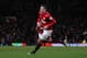 Robin Van Persie leads Man U's attack into Upton Park.