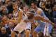 DALLAS, TX - DECEMBER 28: Dirk Nowitzki #41 of the Dallas Mavericks dribbles the ball against Corey Brewer #13 and Danilo Gallinari #8 of the Denver Nuggets at American Airlines Center on December 28, 2012 in Dallas, Texas. NOTE TO USER: User expressly acknowledges and agrees that, by downloading and or using this photograph, User is consenting to the terms and conditions of the Getty Images License Agreement. (Photo by Ronald Martinez/Getty Images)