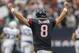 HOUSTON, TX - DECEMBER 16: Matt Schaub #8 of the Houston Texans raises his arms as Arian Foster #23 runs for a big gain in the fourth quarter against the Indianapolis Colts in the second half at Reliant Stadium on December 16, 2012 in Houston, Texas. Texans win 29-17 to clinch the AFC South. (Photo by Bob Levey/Getty Images)