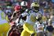 January 1,2013; Tampa, FL, USA; Michigan Wolverines quarterback Denard Robinson (16) runs with the ball against the South Carolina Gamecocks during the second half of the 2013 Outback Bowl at Raymond James Stadium. South Carolina Gamecocks defeated the Michigan Wolverines 33-28. Mandatory Credit: Kim Klement-USA TODAY Sports
