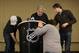 NEW YORK, NY - DECEMBER 05: Video production crews move quickly to wire the newly arrived NHL podium for an upcoming press conference following a day of negotiations between the NHL and the Players Association at the Westin Times Square on December 5, 2012 in New York City. (Photo by Bruce Bennett/Getty Images)