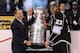 LOS ANGELES, CA - JUNE 11: Commissioner Gary Bettman of the National Hockey League presents the Stanley Cup to Dustin Brown #23 of the Los Angeles Kings after defeating the New Jersey Devils in Game Six of the 2012 Stanley Cup Finals at Staples Center on June 11, 2012 in Los Angeles, California. The Kings defeated the Devils 6-1 to win the series 4 games to 2. (Photo by Christian Petersen/Getty Images)