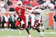 LOUISVILLE, KY - NOVEMBER 03: Teddy Bridgewater #7 of the Louisville Cardinals runs with the ball while defended by Nate Smith #35 of the Temple Owls during the game at Papa John's Cardinal Stadium on November 3, 2012 in Louisville, Kentucky. (Photo by Andy Lyons/Getty Images)