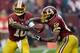 Robert Griffin III handing off to Alfred Morris.