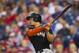 Jun 01, 2012; Philadelphia, PA, USA; Miami Marlins right fielder Giancarlo Stanton (27) hits an RBI double during the first inning against the Philadelphia Phillies at Citizens Bank Park. Mandatory Credit: Howard Smith-USA TODAY Sports