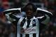 NEWCASTLE UPON TYNE, ENGLAND - NOVEMBER 17: Demba Ba of Newcastle looks on, after missing a chance on goal during the Barclays Premier League match between Newcastle United and Swansea City at St James' Park on November 17, 2012 in Newcastle upon Tyne, England. (Photo by Matthew Lewis/Getty Images)
