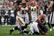 HOUSTON, TX - JANUARY 07: Geno Atkins #97 of the Cincinnati Bengals celebrates after he sacked T.J. Yates #13 of the Houston Texans in the first half during their 2012 AFC Wild Card Playoff game at Reliant Stadium on January 7, 2012 in Houston, Texas. (Photo by Thomas B. Shea/Getty Images)