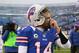 ORCHARD PARK, NY - DECEMBER 30: Ryan Fitzpatrick #14 of the Buffalo Bills walks off the field after a win against the New York Jets at Ralph Wilson Stadium on December 30, 2012 in Orchard Park, New York. (Photo by Rick Stewart/Getty Images)