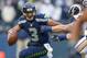SEATTLE, WA - DECEMBER 30: Quarterback Russell Wilson #3 of the Seattle Seahawks rushes against the St. Louis Rams at CenturyLink Field on December 30, 2012 in Seattle, Washington. (Photo by Otto Greule Jr/Getty Images)