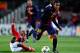 BARCELONA, SPAIN - DECEMBER 05: Rafinha of FC Barcelona (R) duels for the ball with Luisao of SL Benfica during the UEFA Champions League Group G match between FC Barcelona and SL Benfica at Nou Camp on December 5, 2012 in Barcelona, Spain. (Photo by David Ramos/Getty Images)