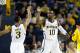 ANN ARBOR, MI - DECEMBER 20: Tim Hardaway Jr. #10 high fives Trey Burke #3 of the Michigan Wolverines after a first half play while playing the Eastern Michigan Eagles at Crisler Center on December 20, 2012 in Ann Arbor, Michigan. (Photo by Gregory Shamus/Getty Images)