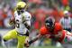 CORVALLIS, OR - NOVEMBER 24: De'Anthony Thomas #6 of the Oregon Ducks runs the ball against Tyrequek Zimmerman #8 of the Oregon State Beavers during the 116th Civil War on November 24, 2012 at the Reser Stadium in Corvallis, Oregon. (Photo by Jonathan Ferrey/Getty Images)