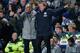 LONDON, ENGLAND - JANUARY 02: Queens Park Rangers manager Harry Redknapp and assistant coach Joe Jordan (L) react during the Barclays Premier League match between Chelsea and Queens Park Rangers at Stamford Bridge on January 2, 2013 in London, England. (Photo by Ian Walton/Getty Images)