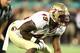 Dec 29, 2011; Orlando, FL, USA; Florida State Seminoles defensive end Brandon Jenkins (49) against the Notre Dame Fighting Irish during the second quarter of the 2011 Champs Sports Bowl at the Citrus Bowl. Mandatory Credit: Douglas Jones-USA TODAY Sports