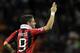 MILAN, ITALY - NOVEMBER 06: Pato of AC Milan celebrates after scoring the equaliser during the UEFA Champions League group C match between AC Milan and Malaga CF at Stadio Giuseppe Meazza on November 6, 2012 in Milan, Italy. (Photo by Claudio Villa/Getty Images)