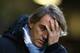 NORWICH, ENGLAND - DECEMBER 29: Manchester City manager Roberto Mancini looks on ahead of the Barclays Premier League match between Norwich City and Manchester City at Carrow Road on December 29, 2012 in Norwich, England. (Photo by Julian Finney/Getty Images)