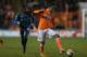 BLACKPOOL, ENGLAND - DECEMBER 21: Thomas Ince of Blackpool moves away from Frank Nouble of Wolverhampton Wanderers during the npower Championship match between Blackpool and Wolverhampton Wanderers at Bloomfield Road on December 21, 2012 in Blackpool, England. (Photo by Clive Brunskill/Getty Images)