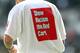 SWANSEA, WALES - OCTOBER 20: Referee, Mike Jones and his assistants warm up with anti racism t-shirts ahead of the Barclays Premier League match between Swansea City and Wigan Athletic at the Liberty Stadium on October 20, 2012 in Swansea, Wales. (Photo by Jan Kruger/Getty Images)