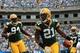 CHARLOTTE, NC - SEPTEMBER 18: Charles Woodson #21 of the Green Bay Packers celebrates after recovering a fumble against the Carolina Panthers during their game at Bank of America Stadium on September 18, 2011 in Charlotte, North Carolina. (Photo by Streeter Lecka/Getty Images)