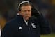 SOUTH BEND, IN - NOVEMBER 03: Head coach Brian Kelly of the Notre Dame Fighting Irish talks to coaches on the headphones during a game against the Pittsburgh Panthers at Notre Dame Stadium on November 3, 2012 in South Bend, Indiana. Notre Dame defeated Pittsburgh 29-26 in triple overtime. (Photo by Jonathan Daniel/Getty Images)