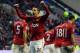 WIGAN, ENGLAND - JANUARY 01: Robin Van Persie of Manchester United celebrates scoring his side's second goal during the Barclays Premier League match between Wigan Athletic and Manchester United at DW Stadium on January 1, 2013 in Wigan, England. (Photo by Chris Brunskill/Getty Images)