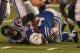 INDIANAPOLIS, IN - DECEMBER 30: Andrew Luck #12 of the Indianapolis Colts is sacked by Antonio Smith #94 of the Houston Texans at Lucas Oil Stadium on December 30, 2012 in Indianapolis, Indiana. The Colts defeated the Texans 28-16. (Photo by Jonathan Daniel/Getty Images)