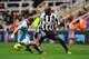NEWCASTLE UPON TYNE, ENGLAND - DECEMBER 15: Demba Ba of Newcastle United battles with Pablo Zabaleta of Manchester City during the Barclays Premier League match between Newcastle United and Manchester City at St James' Park on December 15, 2012 in Newcastle upon Tyne, England. (Photo by Laurence Griffiths/Getty Images)