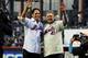 NEW YORK - APRIL 13: Former Mets players Mike Piazza and Tom Seaver greet fans before throwing out the first pitch of the San Diego Padres against the New York Mets during opening day at Citi Field on April 13, 2009 in the Flushing neighborhood of the Queens borough of New York City. This is the first regular season MLB game being played at the new venue which replaced Shea stadium as the Mets home field. (Photo by Jim McIsaac/Getty Images)