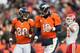 DENVER, CO - DECEMBER 30: Quarterback Peyton Manning #18 and wide receiver Demaryius Thomas #88 of the Denver Broncos run off the field after a score during a game against the Kansas City Chiefs at Sports Authority Field at Mile High on December 30, 2012 in Denver, Colorado. The Broncos defeated the Chiefs 38-3. (Photo by Dustin Bradford/Getty Images)