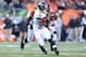 CINCINNATI, OH - DECEMBER 30: Bernard Pierce #30 of the Baltimore Ravens is tackled by Wallace Gilberry #95 of the Cincinnati Bengals at Paul Brown Stadium on December 30, 2012 in Cincinnati, Ohio. (Photo by Andy Lyons/Getty Images)