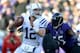 BALTIMORE, MD - JANUARY 06: Andrew Luck #12 of the Indianapolis Colts attempts to pass against Terrell Suggs #55 of the Baltimore Ravens during the AFC Wild Card Playoff Game at M&T Bank Stadium on January 6, 2013 in Baltimore, Maryland. (Photo by Patrick Smith/Getty Images)