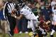 LANDOVER, MD - JANUARY 06: Russell Wilson #3 of the Seattle Seahawks is sacked by Josh Wilson #26 of the Washington Redskins in the third quarter during the NFC Wild Card Playoff Game at FedExField on January 6, 2013 in Landover, Maryland. (Photo by Win McNamee/Getty Images)