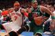 NEW YORK, NY - APRIL 24: Carmelo Anthony #7 of the New York Knicks and Paul Pierce #34 of the Boston Celtics fight for control of a loose ball in the second half of Game Four of the Eastern Conference Quarterfinals during the 2011 NBA Playoffs on April 24, 2011 at Madison Square Garden in New York City. NOTE TO USER: User expressly acknowledges and agrees that, by downloading and or using this photograph, User is consenting to the terms and conditions of the Getty Images License Agreement (Photo by Nick Laham/Getty Images)
