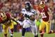 Jan 6, 2013; Landover, MD, USA; Seattle Seahawks running back Marshawn Lynch (24) carries the ball to score a touchdown as Washington Redskins inside linebacker Perry Riley (56) and outside linebacker Ryan Kerrigan (91) chase in the fourth quarter of the NFC Wild Card playoff game at FedEx Field. The Seahawks win 24-14. Mandatory Credit: Geoff Burke-USA TODAY Sports