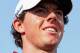 DUBAI, UNITED ARAB EMIRATES - NOVEMBER 24: Rory McIlroy of Northern Ireland smiles on the 14th hole during the third round of the DP World Tour Championship on the Earth Course at Jumeirah Golf Estates on November 24, 2012 in Dubai, United Arab Emirates. (Photo by Andrew Redington/Getty Images)