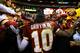 LANDOVER, MD - JANUARY 06: Robert Griffin III #10 of the Washington Redskins greets fans as he leaves the field after their 24 to 14 loss to the Seattle Seahawks during the NFC Wild Card Playoff Game at FedExField on January 6, 2013 in Landover, Maryland. Griffin was injured during the game. (Photo by Al Bello/Getty Images)