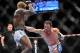 Dec 29, 2012; Las Vegas, NV, USA; Jamie Varner (right) strikes Melvin Guillard (left) during UFC 155 at the MGM Grand Garden Arena. Mandatory Credit: Gary A. Vasquez-USA TODAY Sports