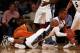 NEW YORK, NY - DECEMBER 04: Jabril Trawick #55 of the Georgetown Hoyas grabs the loose ball from Sheldon McClellan #1 of the Texas Longhorns during the Jimmy V Classic on December 4, 2012 at Madison Square Garden in New York City. (Photo by Elsa/Getty Images)
