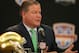 Jan 6, 2013; Fort Lauderdale FL, USA; Notre Dame head coach Brian Kelly (left) answers questions during a press conference for the 2013 BCS National Championship game at Harbor Beach Marriott Resort & Spa. Mandatory Credit: Matthew Emmons-USA TODAY Sports