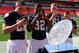 MIAMI GARDENS, FL - JANUARY 05: Players of the Notre Dame Fighting Irish take pictures of the National Championship trophy during Media Day ahead of the Discover BCS National Championship at Sun Life Stadium on January 5, 2013 in Miami Gardens, Florida. (Photo by Streeter Lecka/Getty Images)