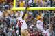 GREEN BAY, WI - SEPTEMBER 9: Vernon Davis #85 of the San Francisco 49ers dunks the football over the goal post after catching a four-yard touchdown pass in the third quarter of the game against the Green Bay Packers at Lambeau Field on September 9, 2012 in Green Bay, Wisconsin. The 49ers won 30-22. (Photo by Joe Robbins/Getty Images)