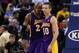 OAKLAND, CA - DECEMBER 22: Kobe Bryant #24 of the Los Angeles Lakers celebrates with Steve Nash #10 in the final seconds of overtime after they secured their victory over the Golden State Warriors at Oracle Arena on December 22, 2012 in Oakland, California. NOTE TO USER: User expressly acknowledges and agrees that, by downloading and or using this photograph, User is consenting to the terms and conditions of the Getty Images License Agreement. (Photo by Ezra Shaw/Getty Images)